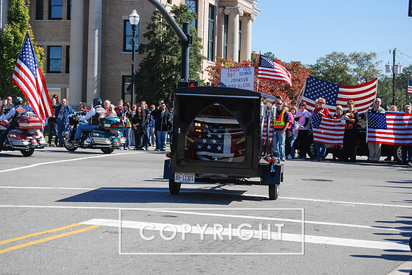 Flag draped coffin.